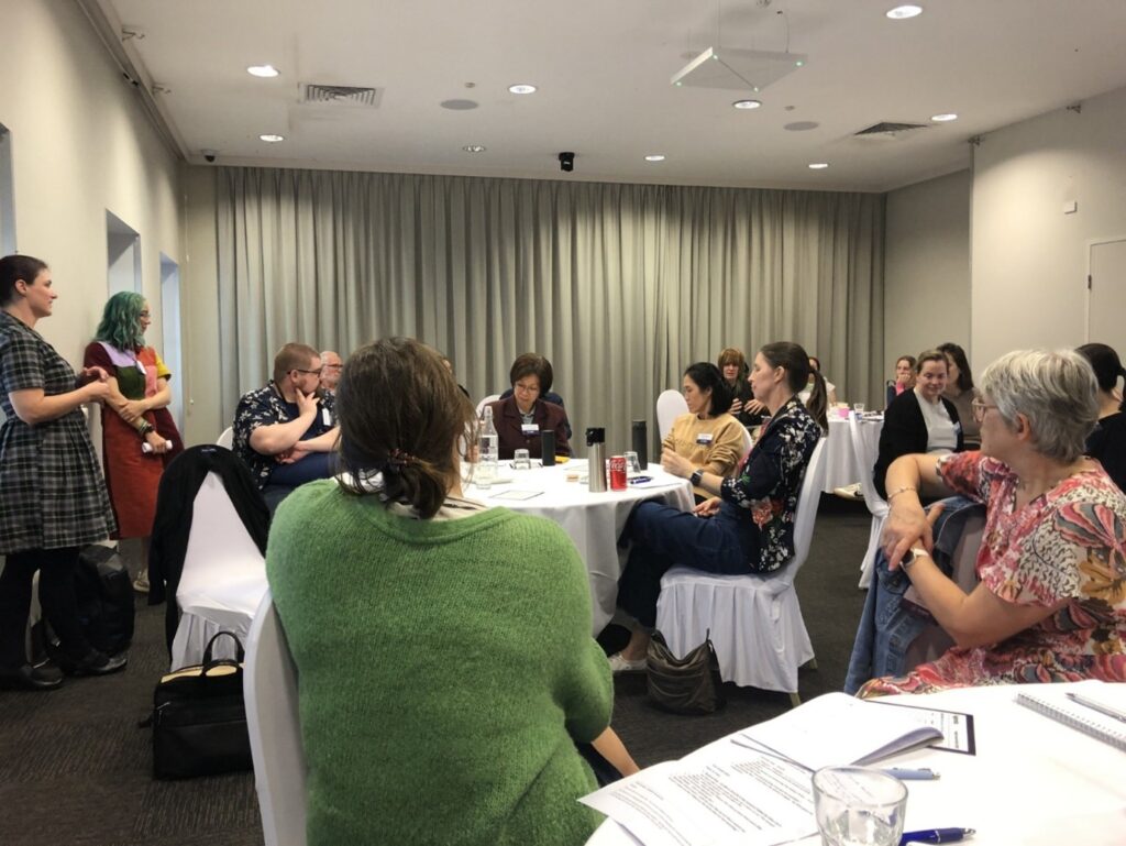 Photograph of librarians taking part in user group discussion hosted by TAUG reps Natalie and Bex